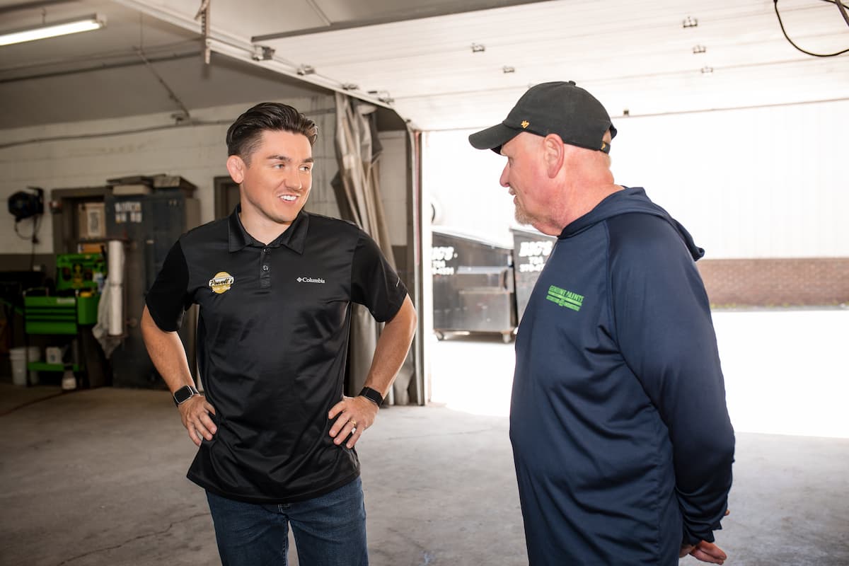 Tech-talking-at-Powells-Auto-Body
