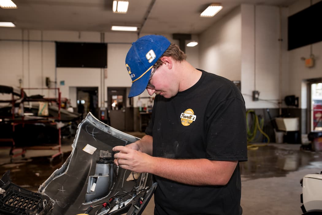 auto body tech working on a Ford Certified Repair (1) auto-body-tech-working-on-a-Ford-Certified-Repair